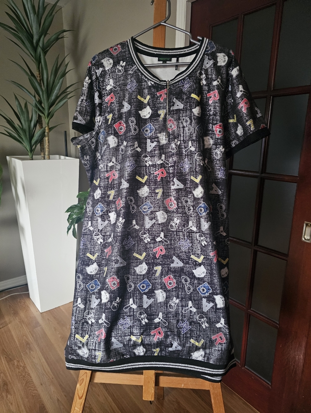 Black and silver tunic dress with multicolored graphic print